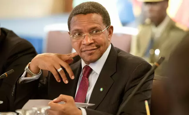 FILE - Tanzania President Jakaya Kikwete along with other East African Presidents, attends a breakfast discussion at the U.S. Chamber of Commerce in Washington, Thursday, Aug. 7, 2014. (AP Photo/Molly Riley, File)