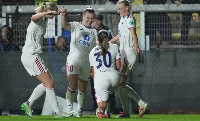 Valerenga's Stine Brekken, 3rd from left, celebrates after scoring during the women's Champions League soccer match between Roma and Valerenga, in Rome, Tuesday, Nov. 11, 2025. (Alfredo Falcone/LaPresse via AP)