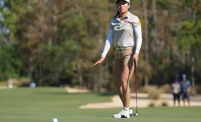 Jeeno Thitikul of Thailand gesture on the seventh green during the final round of the LPGA Tour Championship golf tournament, Sunday, Nov. 23, 2025, in Naples, Fla. (AP Photo/Marta Lavandier)