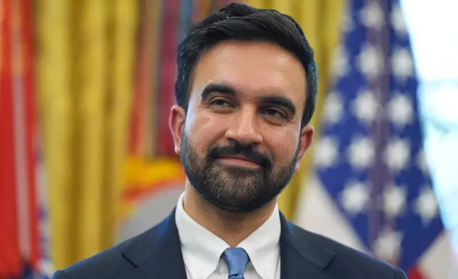 New York City Mayor-elect Zohran Mamdani listens as President Donald Trump speaks in the Oval Office of the White House, Friday, Nov. 21, 2025, in Washington. (AP Photo/Evan Vucci)