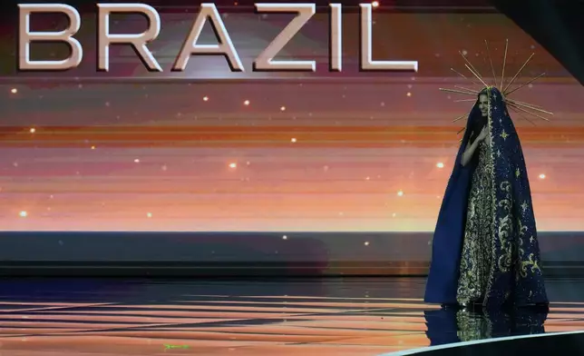 Miss Brazil Gabriela Lacerda competes in the national costume competition at the Miss Universe Beauty Pageant in Nonthaburi province, Thailand, Wednesday, Nov. 19, 2025. (AP Photo/Sakchai Lalit)