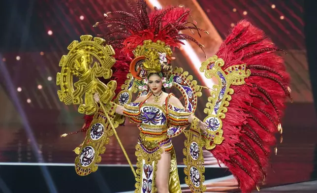 Miss Panama Mirna Caballini competes in the national costume competition at the Miss Universe Beauty Pageant in Nonthaburi province, Thailand, Wednesday, Nov. 19, 2025. (AP Photo/Sakchai Lalit)