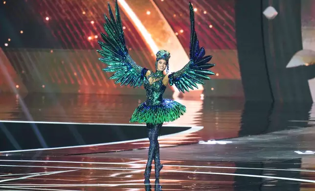 Miss Puerto Rico Zashely Alicea competes in the national costume competition at the Miss Universe Beauty Pageant in Nonthaburi province, Thailand, Wednesday, Nov. 19, 2025. (AP Photo/Sakchai Lalit)