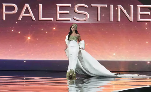 Miss Palestine Nadeen Ayoub competes in the national costume competition at the Miss Universe Beauty Pageant in Nonthaburi province, Thailand, Wednesday, Nov. 19, 2025. (AP Photo/Sakchai Lalit)