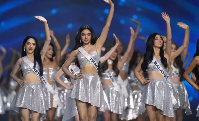 Contestants take part in the final round of the 74th Miss Universe Beauty Pageant in Nonthaburi province, Thailand, Friday, Nov. 21, 2025. (AP Photo/Sakchai Lalit)