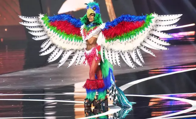 Miss Haiti Melissa Sapini competes in the national costume competition at the Miss Universe Beauty Pageant in Nonthaburi province, Thailand, Wednesday, Nov. 19, 2025. (AP Photo/Sakchai Lalit)