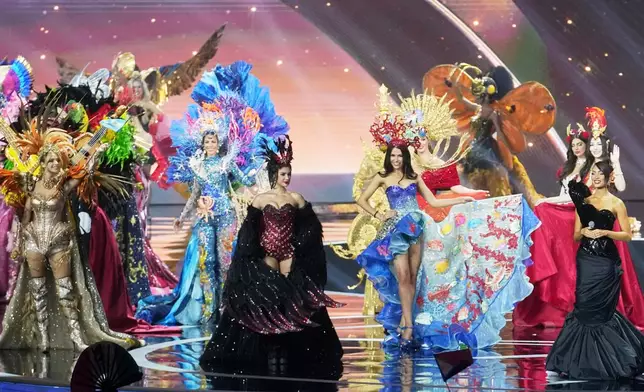 Contestants compete in the national costume competition at the Miss Universe Beauty Pageant in Nonthaburi province, Thailand, Wednesday, Nov. 19, 2025. (AP Photo/Sakchai Lalit)