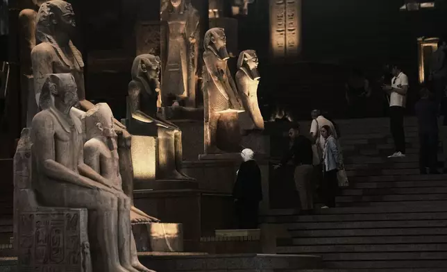 Tourists visit the Grand Egyptian Museum in Giza, Egypt, Friday, May 23, 2025. (AP Photo/Amr Nabil)