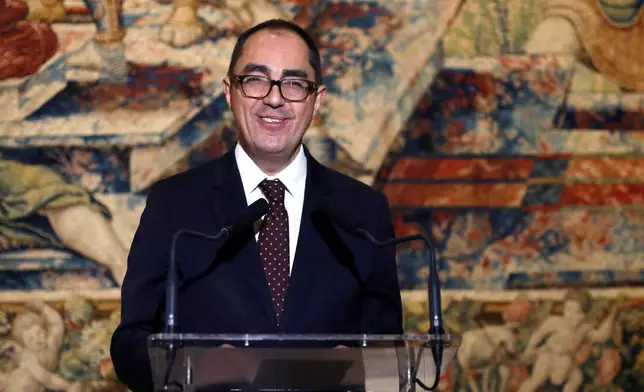 FILE - Louvre Museum Director Jean-Luc Martinez delivers a speech during a crowdfunding campaign at the Louvre museum in Paris, Oct. 24, 2017. (AP Photo/Thibault Camus, File)