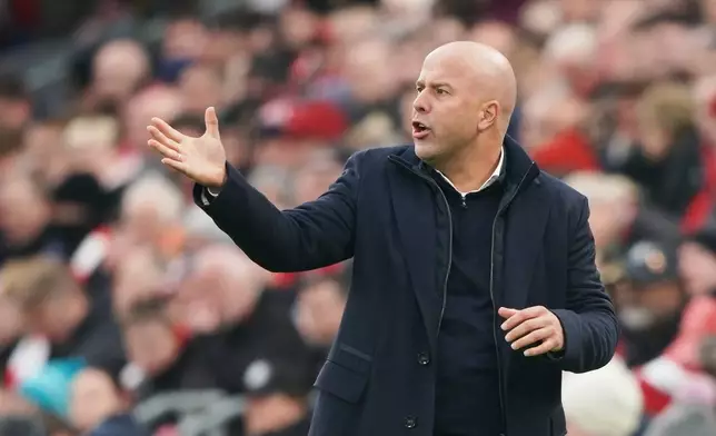 Liverpool's manager Arne Slot gives instructions from the side line during the English Premier League soccer match between Liverpool and Nottingham Forest in Liverpool, England, Saturday, Nov. 22, 2025. (AP Photo/Ian Hodgson)