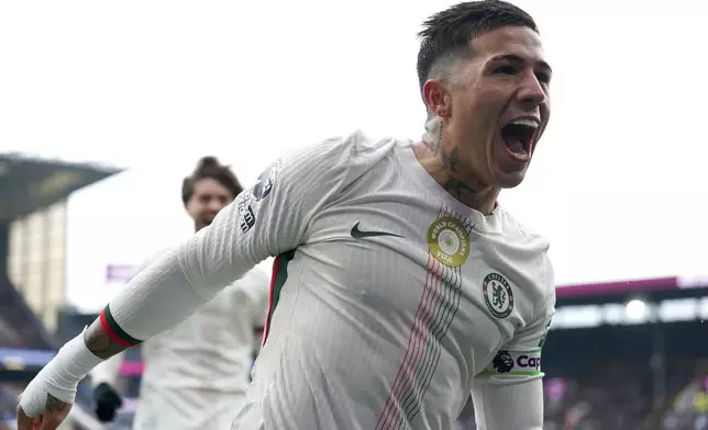Chelsea's Enzo Fernandez celebrates scoring their side's second goal during the English Premier League soccer match between Burnley v Chelsea, in Burnley, England, Saturday, Nov. 22, 2025. (Martin Rickett/PA via AP)