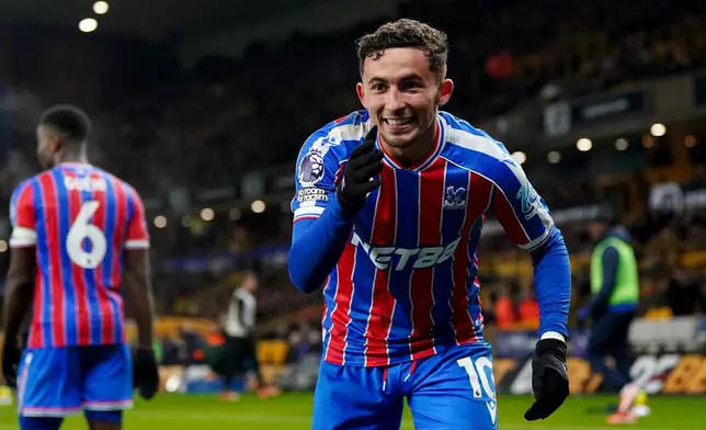 Crystal Palace's Yeremi Pino celebrates scoring during the English Premier League soccer match at Molineux Stadium, Wolverhampton, England, Saturday Nov. 22, 2025. (Nick Potts/PA via AP)
