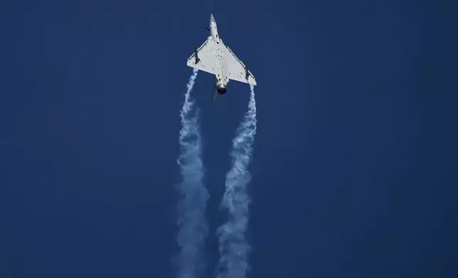 The Dassault Mirage 2000-9 performs during the Dubai Air Show in Dubai, United Arab Emirates, Tuesday, Nov. 18, 2025. (AP Photo/Fatima Shbair)