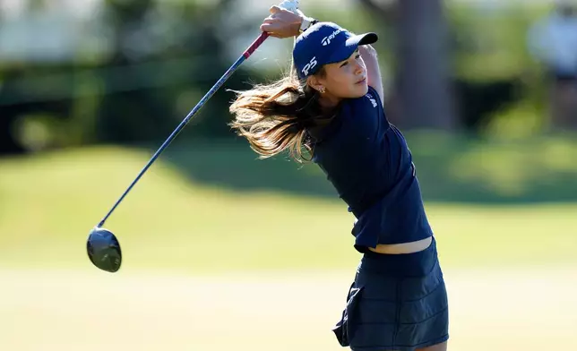 Kai Trump, granddaughter of President Donald Trump, hits on the 17th hole during the first round of The Annika LPGA golf tournament Thursday, Nov. 13, 2025, in Belleair, Fla. (AP Photo/Chris O'Meara)