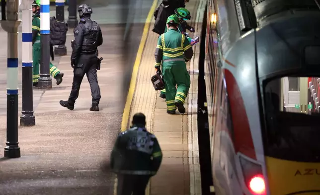 Emergency personnel inspect a train at the Huntingdon, England, train station in Cambridgeshire after people were stabbed Saturday, Nov. 1, 2025. (Chris Radburn/PA via AP)
