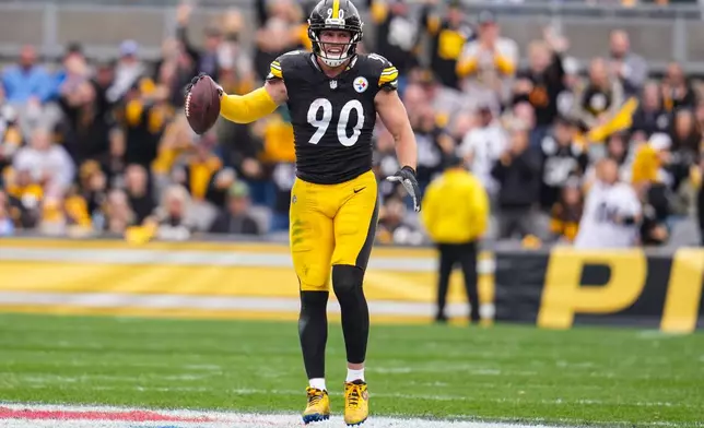 Pittsburgh Steelers linebacker T.J. Watt (90) celebrates after a fumble recovery against the Indianapolis Colts during the first half of an NFL football game in Pittsburgh, Sunday, Nov. 2, 2025. (AP Photo/Gene J. Puskar)