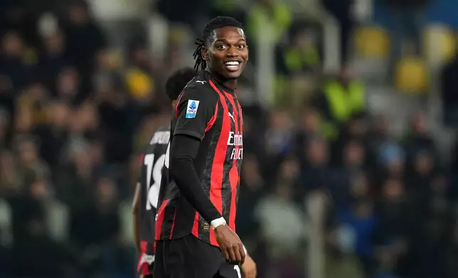 AC Milan's Rafael Leao celebrates after scoring during the Serie A soccer match between Parma and Milan in Parma, Italy, Sunday, Nov. 8, 2025. (Massimo Paolone/LaPresse via AP)