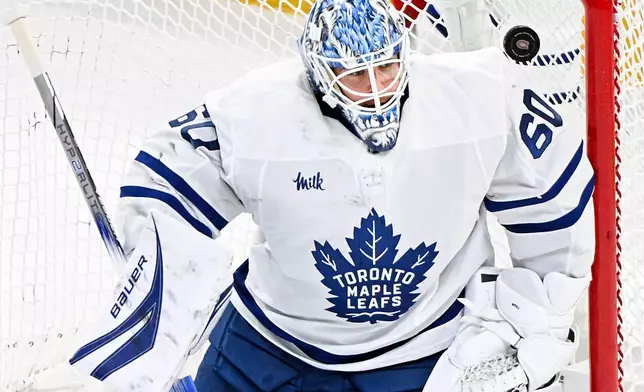 Toronto Maple Leafs goaltender Joseph Woll is scored on by Montreal Canadiens' Josh Anderson (not shown) during second period NHL hockey action in Montreal, Saturday, Nov. 22, 2025. (Graham Hughes/The Canadian Press via AP)