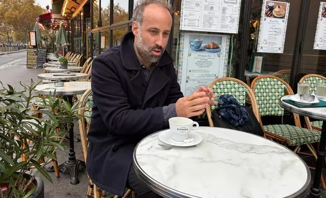 President of victims' association Life for Paris, Arthur Denouveaux answers the Associated Press, Friday, Nov.7, 2025 in Paris. (AP Photo/Nicolas Garriga)