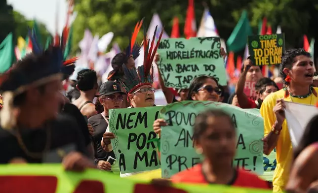 Demonstrators participate in a climate protest during the COP30 U.N. Climate Summit, Saturday, Nov. 15, 2025, in Belem, Brazil. (AP Photo/Joshua A. Bickel)