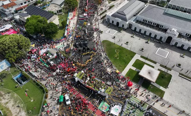 Activists participate in a climate protest during the COP30 U.N. Climate Summit, Saturday, Nov. 15, 2025, in Belem, Brazil. (AP Photo/Andre Penner)