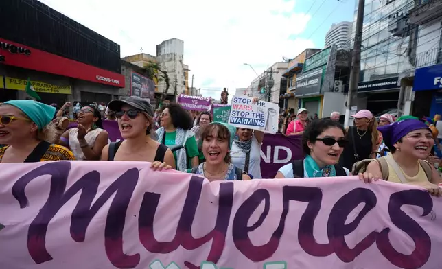 Activists participate in a climate protest during the COP30 U.N. Climate Summit, Saturday, Nov. 15, 2025, in Belem, Brazil. (AP Photo/Fernando Llano)