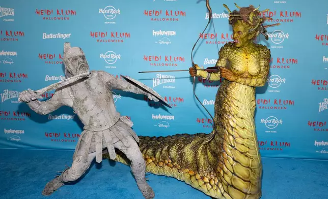 Tom Kaulitz, left, and Heidi Klum attend Heidi Klum's 24th annual Halloween party at Hard Rock Hotel New York on Friday, Oct. 31, 2025, in New York. (Photo by CJ Rivera/Invision/AP)