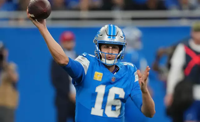 Detroit Lions quarterback Jared Goff (16) passes during the first half of an NFL football game against the Minnesota Vikings Sunday, Nov. 2, 2025, in Detroit. (AP Photo/Paul Sancya)