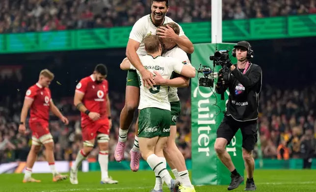 South Africa's Ethan Hooker celebrates scoring a try during the rugby union international match between Wales and South Africa in Cardiff, Wales, Saturday Nov. 29, 2025. (Andrew Matthews/PA via AP)