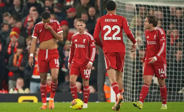 From left, Liverpool's Cody Gakpo, Alexis Mac Allister, Hugo Ekitike, Federico Chiesa react after Nottingham Forest's Morgan Gibbs-White scored his side's third goal during the English Premier League soccer match between Liverpool and Nottingham Forest in Liverpool, England, Saturday, Nov. 22, 2025. (AP Photo/Ian Hodgson)