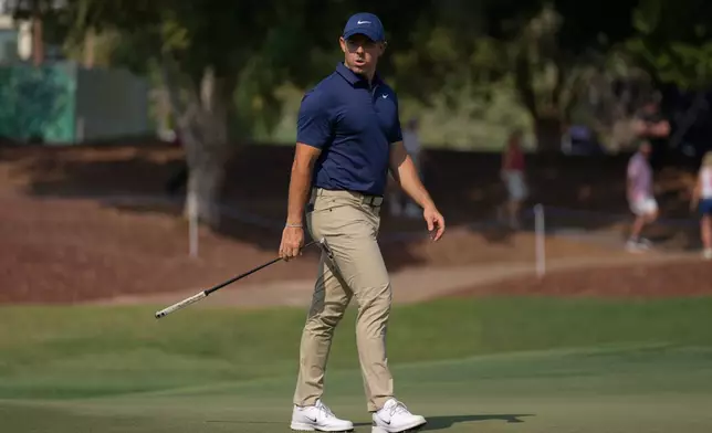 Rory McIlroy of Northern Ireland walks on the 5th fairway during the second round of World Tour Golf Championship at Jumeirah Golf Estates, in Dubai, United Arab Emirates, Friday, Nov. 14, 2025. (AP Photo/Altaf Qadri)
