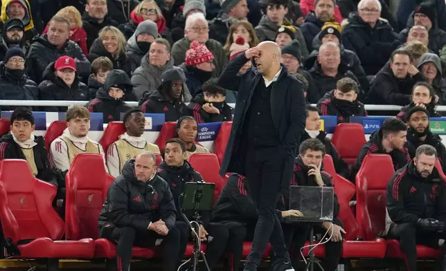 Liverpool's manager Arne Slot reacts during the Champions League opening phase soccer match between Liverpool and PSV in Liverpool, England, Wednesday, Nov. 26, 2025. (AP Photo/Jon Super)