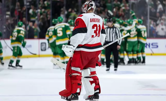 Carolina Hurricanes goaltender Frederik Andersen (31) skates off the ice after his teams shootout loss after an NHL hockey game Wednesday, Nov. 19, 2025, in St. Paul, Minn. (AP Photo/Matt Krohn)