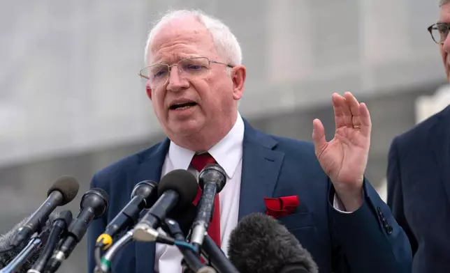 FILE - John Eastman, a California law professor, speaks to reporters after the Supreme Court hearing on Birthright Citizenship outside of the Supreme Court in Washington, May 15, 2025. (AP Photo/Jose Luis Magana, File)