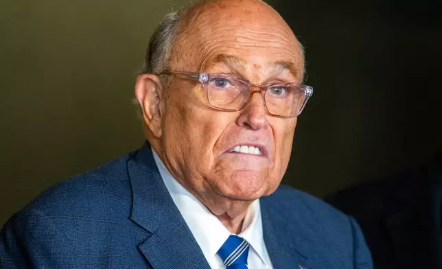 FILE - Rudy Giuliani speaks to the media outside Manhattan federal court in New York, Jan. 3, 2025. (AP Photo/Ted Shaffrey, File)