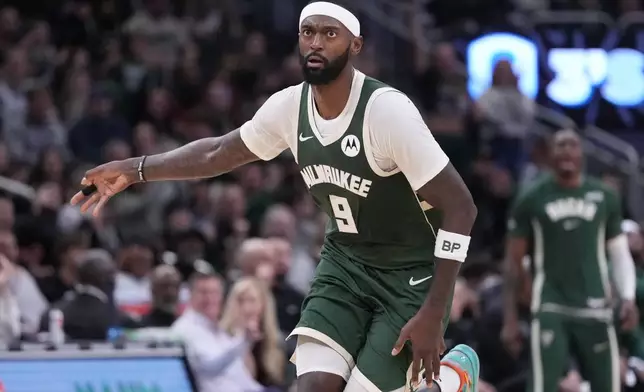 Milwaukee Bucks' Bobby Portis reacts to hus three pointer during the first half of an NBA basketball game Saturday, Nov. 22, 2025, in Milwaukee. (AP Photo/Morry Gash)