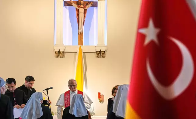 Pope Leo XIV visits the nursing home of the Little Sisters of the Poor, in Istanbul, Turkey, Friday, Nov. 28, 2025. (AP Photo/Domenico Stinellis)