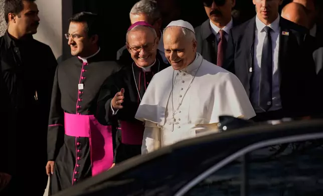 Pope Leo XIV leaves the Cathedral of the Holy Spirit, in Istanbul, Turkey, Friday, Nov. 28, 2025, during his first foreign trip. (AP Photo/Emrah Gurel)