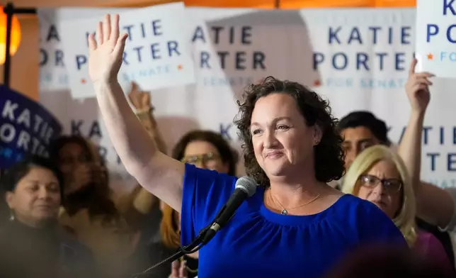 FILE - U.S. Rep. Katie Porter, D-Calif., waves at supporters at an election night party, March 5, 2024, in Long Beach, Calif. (AP Photo/Damian Dovarganes, File)