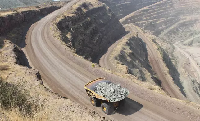 A truck carries rough stones from the Orapa open cast mine in Lethakane, Botswana, Sept. 14, 2025. (AP Photo/Sello Motseta)