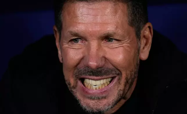 Atletico Madrid's head coach Diego Simeone reacts at the bench during the Champions League opening phase soccer match between Atletico Madrid and Inter Milan, in Madrid, Spain, Wednesday, Nov. 26, 2025. (AP Photo/Manu Fernandez)