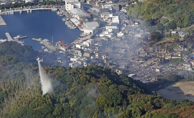 This shows the aftermath of a fire in Oita, southern Japan Wednesday, Nov. 19, 2025. (Takumi Sato/Kyodo News via AP)