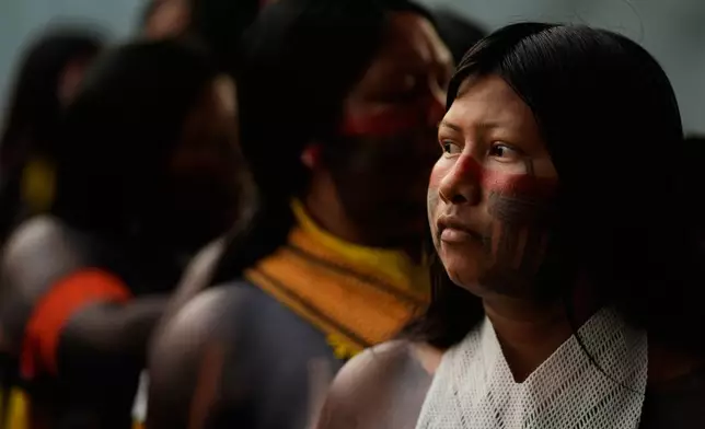 An Indigenous group attends the opening ceremony of the People's Summit offsite from the COP30 U.N. Climate Summit, Wednesday, Nov. 12, 2025, in Belem, Brazil. (AP Photo/Fernando Llano)