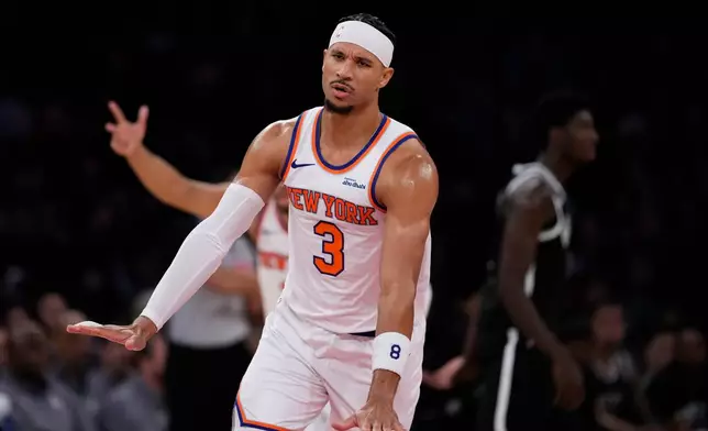 New York Knicks' Josh Hart (3) gestures after making a three-point shot during the second half of an NBA basketball game against the Brooklyn Nets Sunday, Nov. 9, 2025, at Madison Square Garden in New York. (AP Photo/Frank Franklin II)