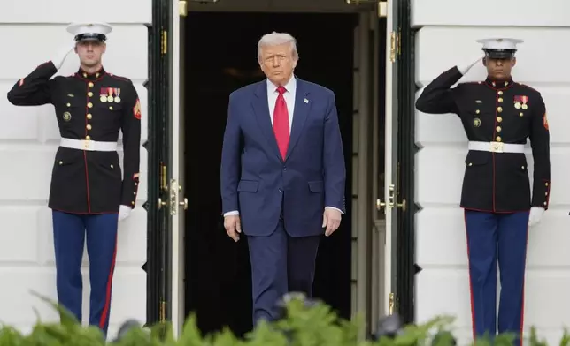 President Donald Trump waits to welcome Saudi Arabia's Crown Prince Mohammed bin Salman to the White House, Tuesday, Nov. 18, 2025, in Washington. (AP Photo/Mark Schiefelbein)