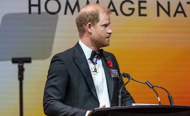 Britain's Prince Harry, Duke of Sussex, delivers remarks at the True Patriot Love's National Tribute Dinner in Toronto, Thursday, Nov. 6, 2025. (Eduardo Lima/The Canadian Press via AP)