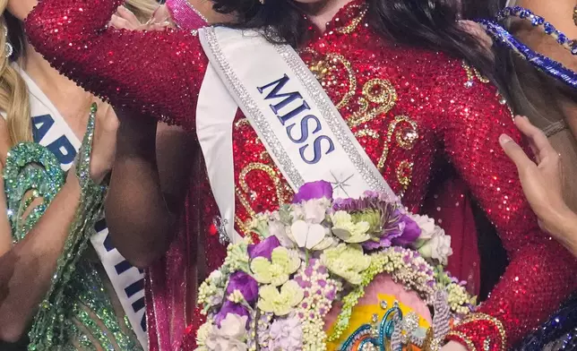 FILE - Fátima Bosch Fernández of Mexico smiles after she was crowned Miss Universe 2025 in Nonthaburi, Thailand, Nov. 21, 2025. (AP Photo/Sakchai Lalit, File)