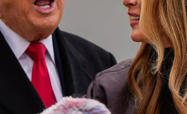 FILE - President Donald Trump and first lady Melania Trump stand next to national Thanksgiving turkey Gobble during a pardoning ceremony in the Rose Garden of the White House, Nov. 25, 2025. (AP Photo/Julia Demaree Nikhinson, File)