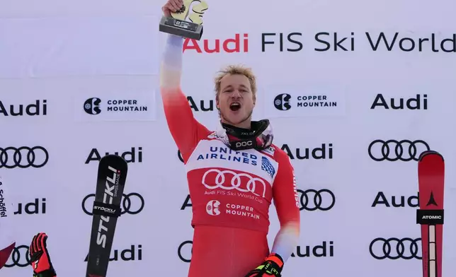 Switzerland's Marco Odermatt celebrates after winning a World Cup men's super-G skiing race, Thursday, Nov. 27, 2025, in Copper Mountain. (AP Photo/John Locher)