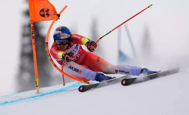 Switzerland's Marco Odermatt competes during a World Cup men's super-G skiing race, Thursday, Nov. 27, 2025, in Copper Mountain. (AP Photo/Robert F. Bukaty)